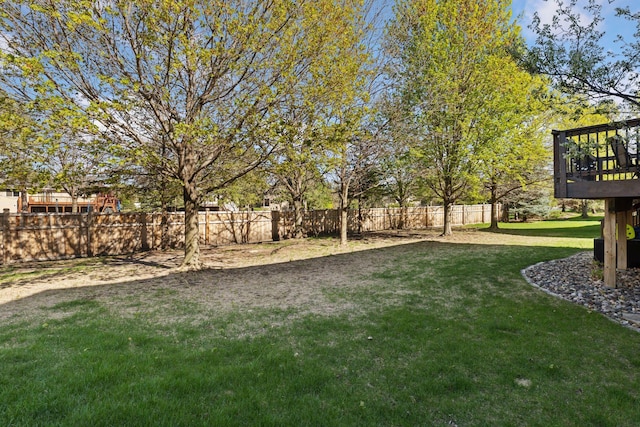 view of yard featuring a wooden deck