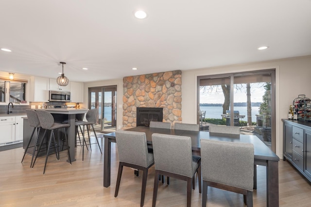 3008 Highland Blvd, Mound, MN 55364 - dining room featuring plenty of natural light, light wood finished floors, recessed lighting, and a water view