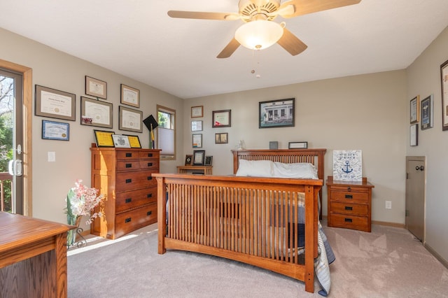 3008 Highland Blvd, Mound, MN 55364 - bedroom with light carpet, multiple windows, and baseboards