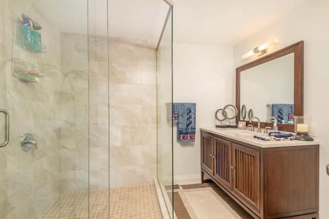 3008 Highland Blvd, Mound, MN 55364 - full bathroom featuring a stall shower, vanity, wood finished floors, and baseboards