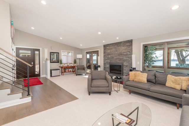 3008 Highland Blvd, Mound, MN 55364 - living room with vaulted ceiling, stairway, plenty of natural light, a stone fireplace, and recessed lighting