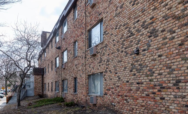2446 Aldrich Ave S Unit 111, Minneapolis, MN 55405 - view of property exterior with brick siding