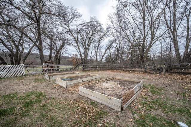 32955 County 24th Blvd, Cannon Falls, MN 55009 - view of yard featuring a garden and fence