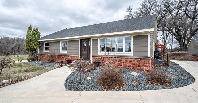 32955 County 24th Blvd, Cannon Falls, MN 55009 - ranch-style house featuring roof with shingles and stone siding