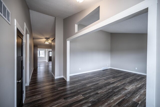 32955 County 24th Blvd, Cannon Falls, MN 55009 - interior space with visible vents, ceiling fan, baseboards, and dark wood-style floors