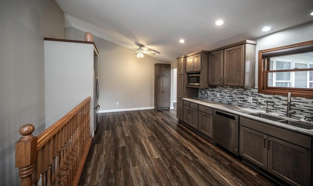 32955 County 24th Blvd, Cannon Falls, MN 55009 - kitchen with a ceiling fan, vaulted ceiling, appliances with stainless steel finishes, dark wood-style flooring, and a sink