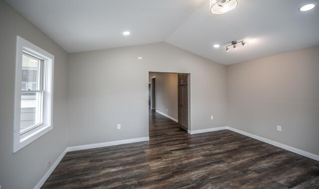 32955 County 24th Blvd, Cannon Falls, MN 55009 - spare room featuring baseboards, dark wood-style floors, vaulted ceiling, and recessed lighting