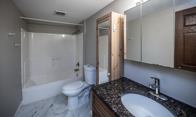 32955 County 24th Blvd, Cannon Falls, MN 55009 - full bath featuring vanity, visible vents, toilet, shower / bath combination, and marble finish floor