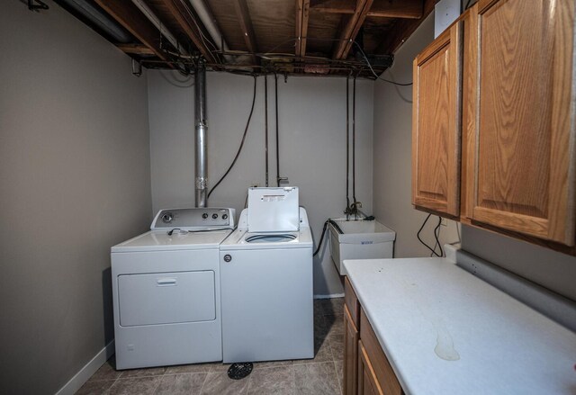 32955 County 24th Blvd, Cannon Falls, MN 55009 - laundry room featuring baseboards, a sink, cabinet space, and washer and clothes dryer