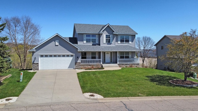 view of front facade with a porch, a shingled roof, a garage, driveway, and a front lawn
