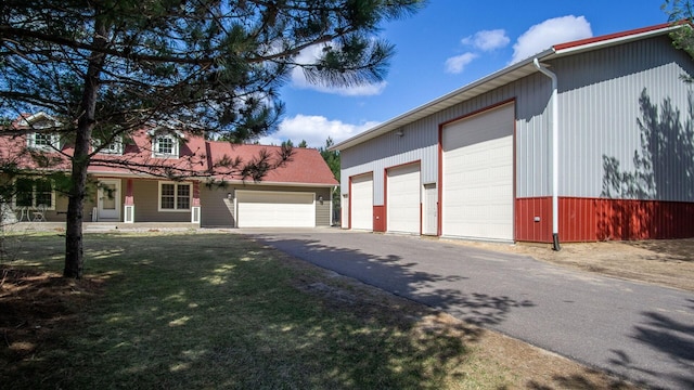 view of side of home featuring a lawn