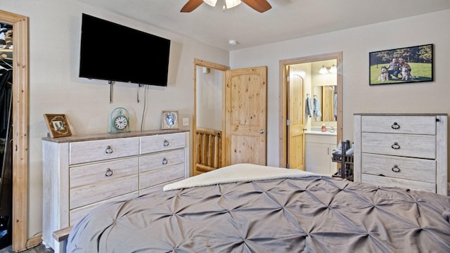 bedroom with ceiling fan and connected bathroom