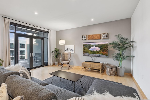 3104 Lake St Unit 410, Minneapolis, MN 55416 - living area featuring wood finished floors, recessed lighting, and french doors