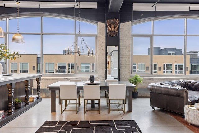 dining area with a notable chandelier