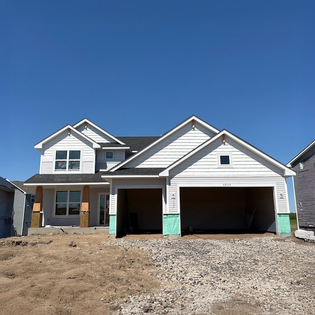 5909 Rathbun Ave NE, Otsego, MN 55374 - view of front of property featuring an attached garage and driveway