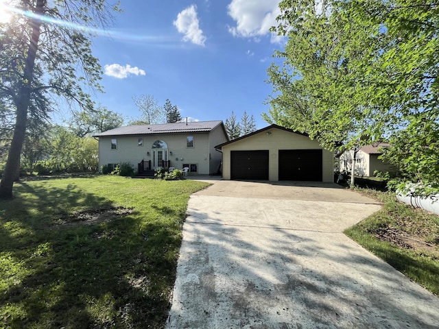29251 Ashby Estates Rd E, Pelican Lake Twp, MN 56309 - view of front facade featuring an outbuilding, a front lawn, and a detached garage