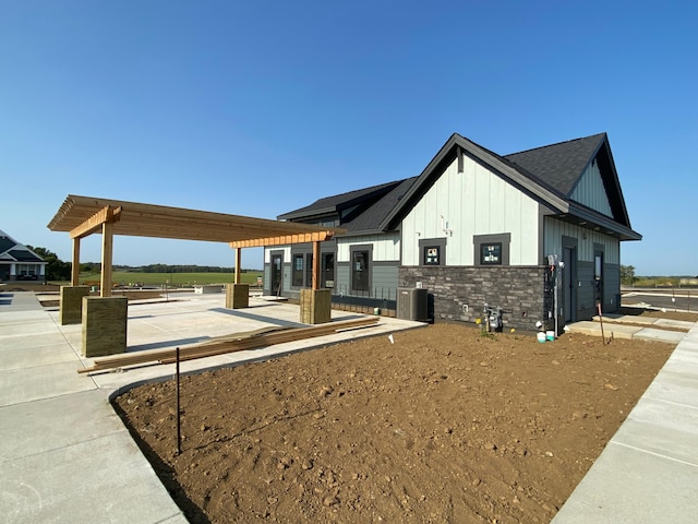 exterior space featuring a pergola