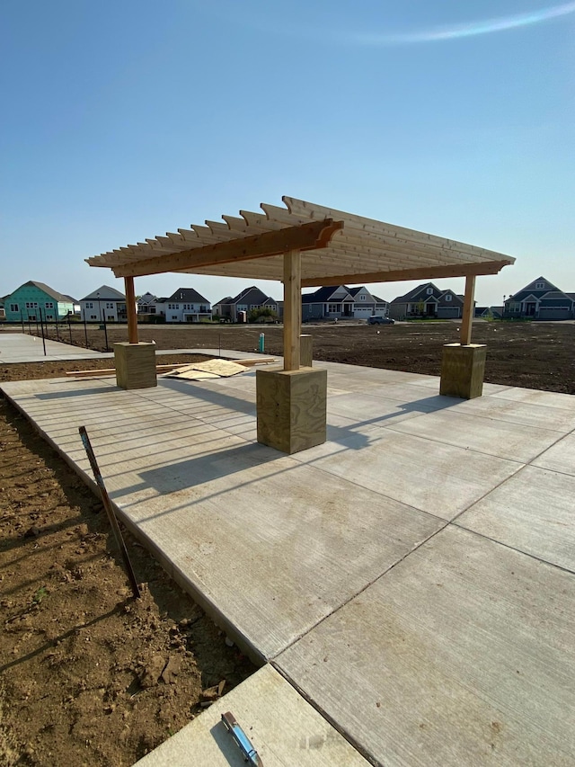 surrounding community with a pergola and a residential view