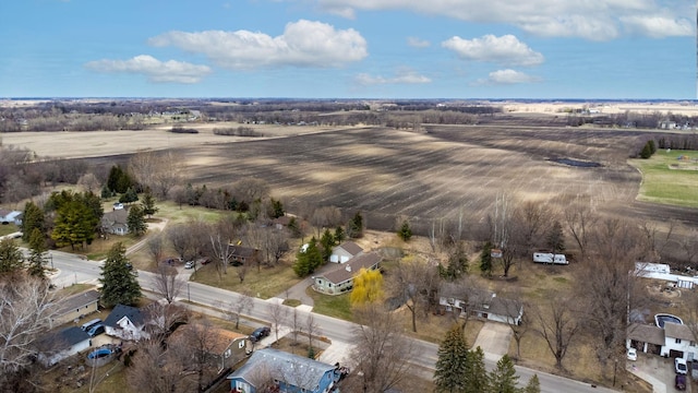 birds eye view of property with a rural view and a residential view