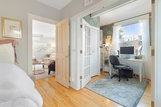 home office with hardwood / wood-style floors