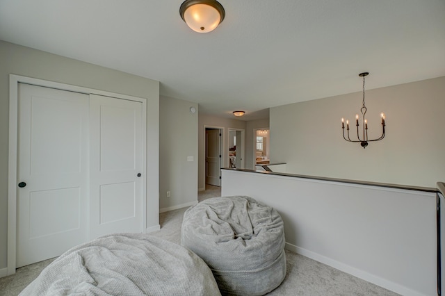 11422 34th St N, Lake Elmo, MN 55042 - living area featuring a chandelier, baseboards, and light colored carpet