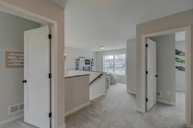 11422 34th St N, Lake Elmo, MN 55042 - hall featuring light colored carpet, an upstairs landing, and baseboards