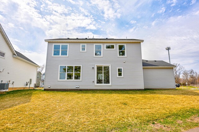 11422 34th St N, Lake Elmo, MN 55042 - rear view of property with a yard