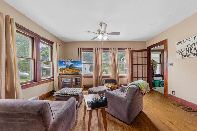 32673 Rosewood Ln, Saint Peter, MN 56082 - living area featuring light wood finished floors, ceiling fan, and baseboards