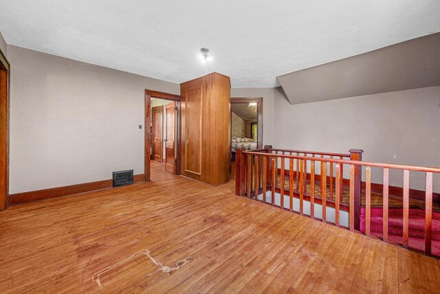 32673 Rosewood Ln, Saint Peter, MN 56082 - spare room featuring wood-type flooring and baseboards
