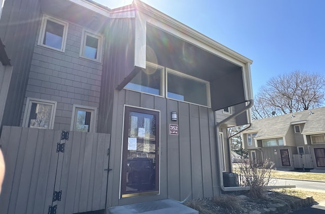 entrance to property featuring board and batten siding