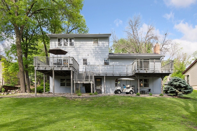 14704 Glendale Ave SE, Prior Lake, MN 55372 - back of property featuring a wooden deck, a yard, and a chimney