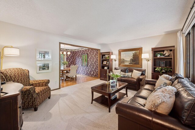 14704 Glendale Ave SE, Prior Lake, MN 55372 - living room featuring light carpet and a chandelier