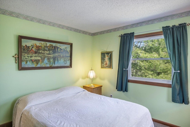 bedroom with a textured ceiling
