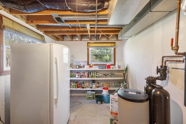 basement with freestanding refrigerator