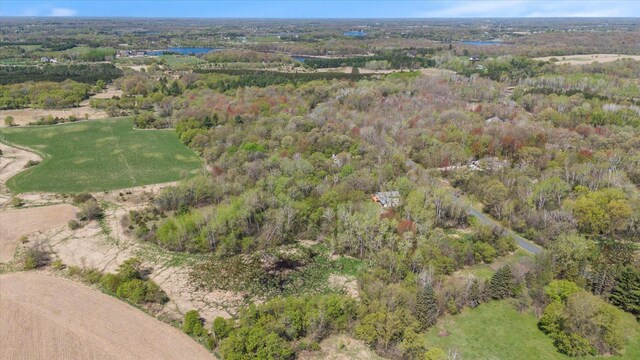 aerial overview of property's location with a forest