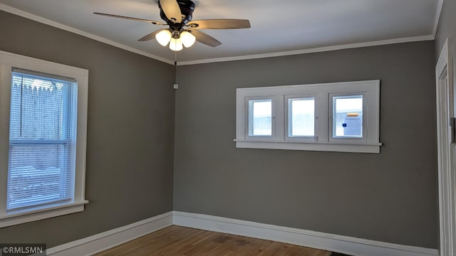 3454 Newton Ave N, Minneapolis, MN 55412 - empty room with baseboards, ceiling fan, wood finished floors, and crown molding