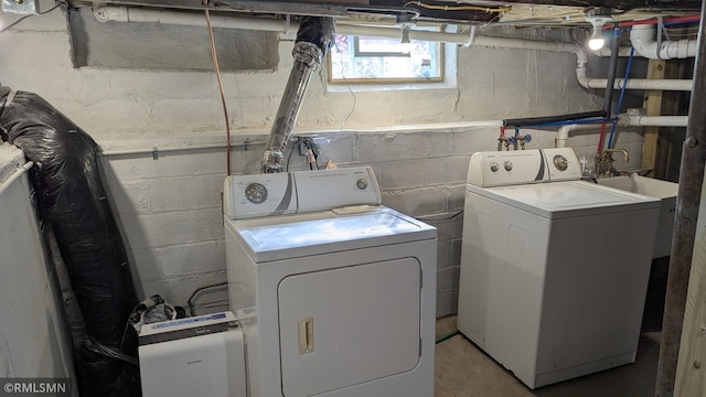 3454 Newton Ave N, Minneapolis, MN 55412 - laundry room featuring washing machine and clothes dryer