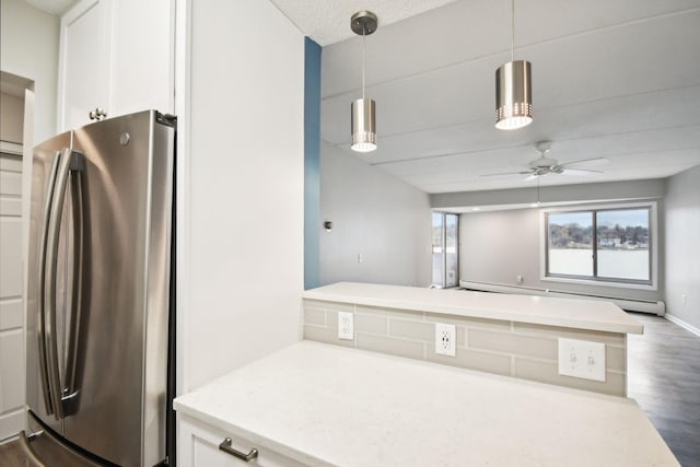 329 Geneva Ave N Unit 212, Oakdale, MN 55128 - kitchen featuring dark wood-style flooring, light countertops, ceiling fan, freestanding refrigerator, and white cabinetry