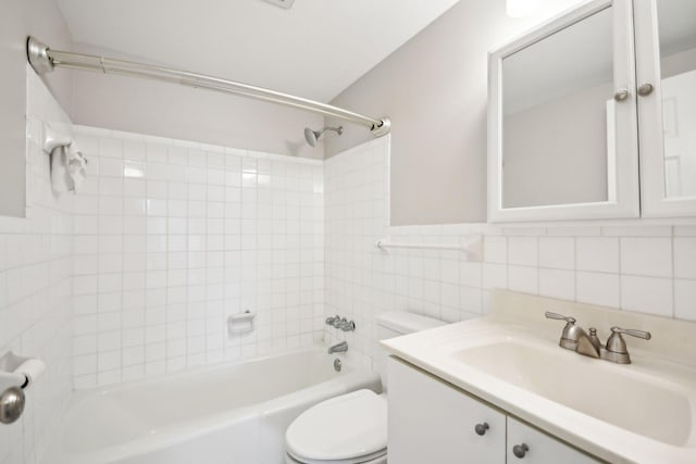 329 Geneva Ave N Unit 212, Oakdale, MN 55128 - bathroom with washtub / shower combination, vanity, tile walls, and toilet