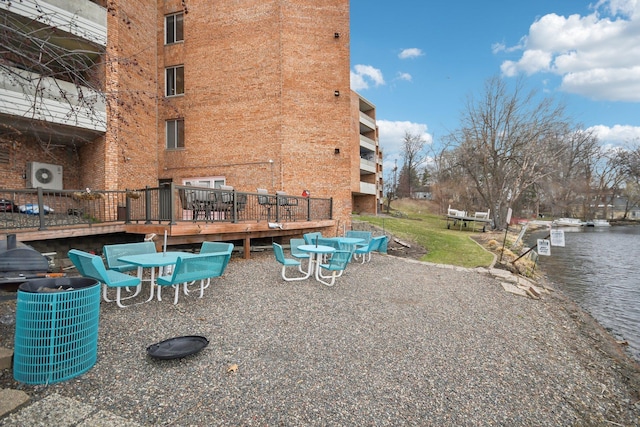 329 Geneva Ave N Unit 212, Oakdale, MN 55128 - view of community with a deck with water view