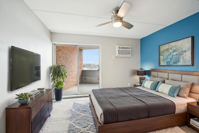 329 Geneva Ave N Unit 212, Oakdale, MN 55128 - bedroom featuring access to outside, a wall unit AC, and a ceiling fan