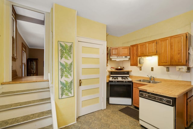 1757 Minnehaha Ave W, Saint Paul, MN 55104 - kitchen with white appliances, a sink, under cabinet range hood, and light countertops