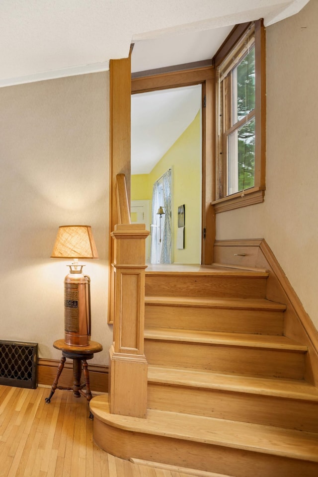 1757 Minnehaha Ave W, Saint Paul, MN 55104 - stairs with hardwood / wood-style flooring and plenty of natural light