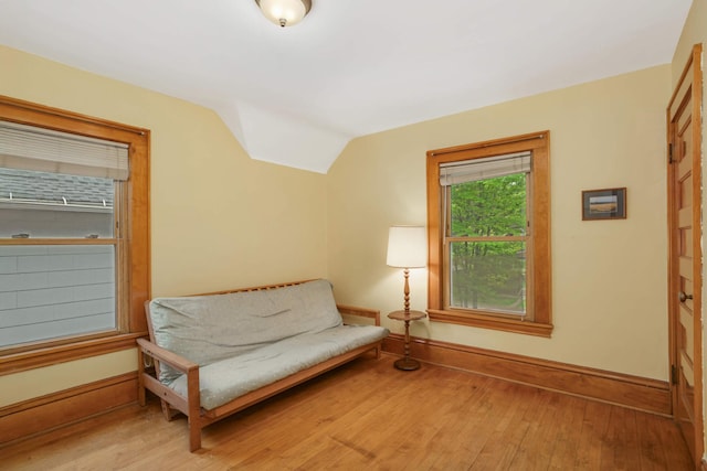 1757 Minnehaha Ave W, Saint Paul, MN 55104 - sitting room featuring wood-type flooring, vaulted ceiling, and baseboards