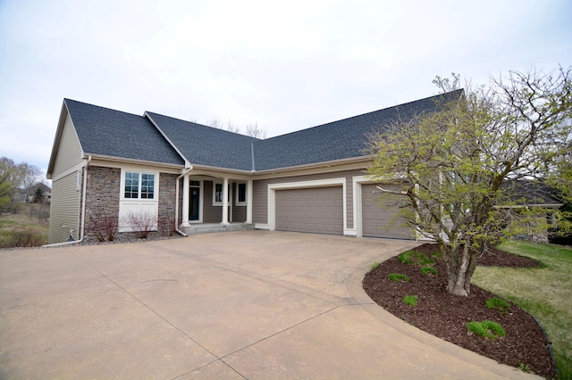 13258 Derryglenn Ct, Rosemount, MN 55068 - view of front of property with a garage, roof with shingles, concrete driveway, and stone siding