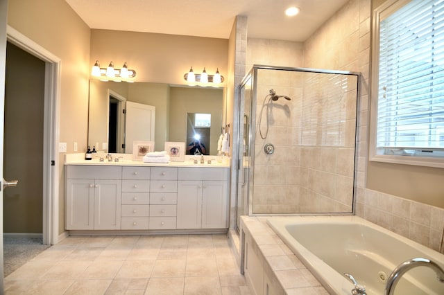 13258 Derryglenn Ct, Rosemount, MN 55068 - full bathroom featuring a jetted tub, a stall shower, double vanity, tile patterned floors, and recessed lighting