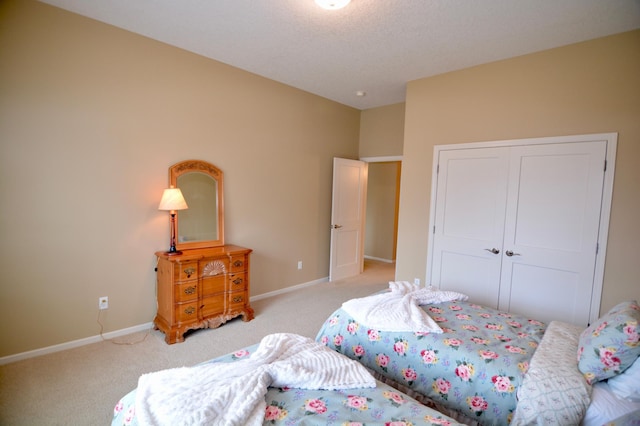 13258 Derryglenn Ct, Rosemount, MN 55068 - bedroom with light colored carpet, baseboards, and a closet