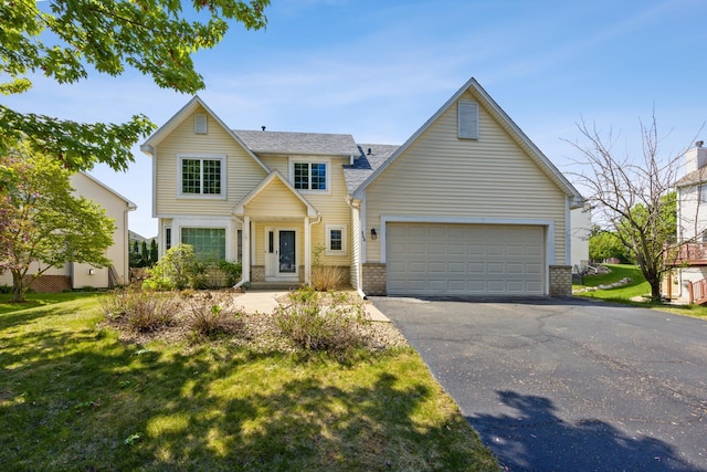 640 Falcon Ridge Rd, Woodbury, MN 55125 - traditional-style home featuring asphalt driveway, a front lawn, and brick siding