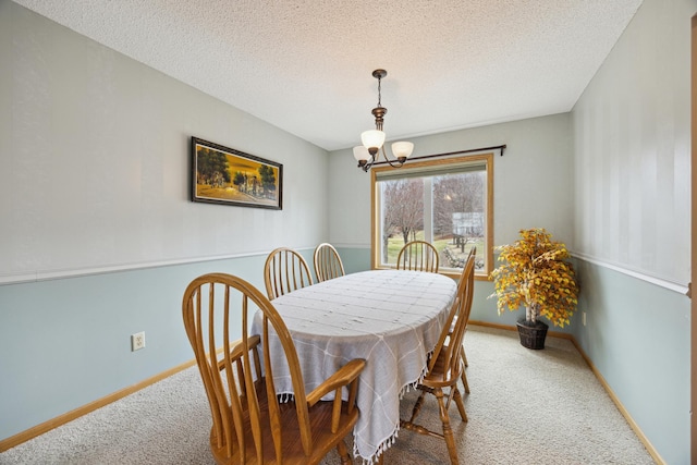 640 Falcon Ridge Rd, Woodbury, MN 55125 - dining room featuring carpet, a chandelier, a textured ceiling, and baseboards