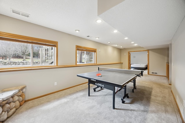 640 Falcon Ridge Rd, Woodbury, MN 55125 - game room featuring light carpet, recessed lighting, a textured ceiling, and baseboards